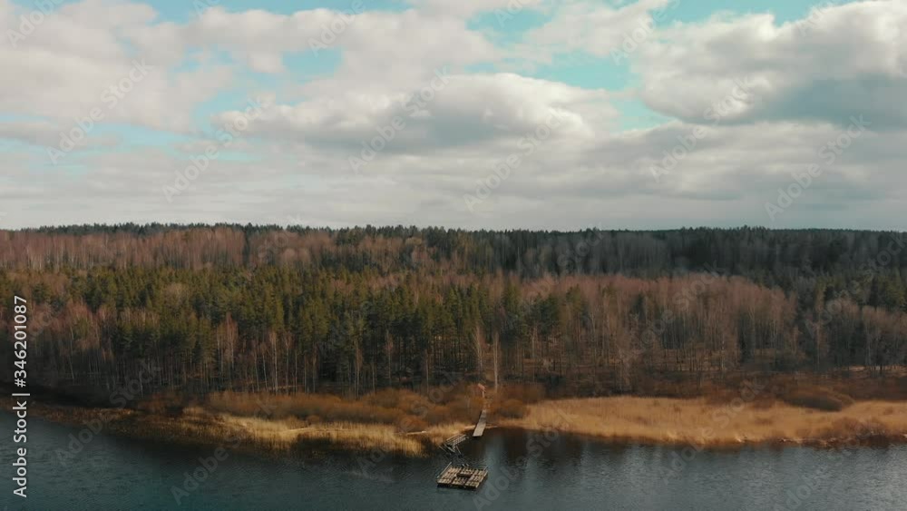 Aerial view of a pine forest and lake Aerial view of a pine forest and lake