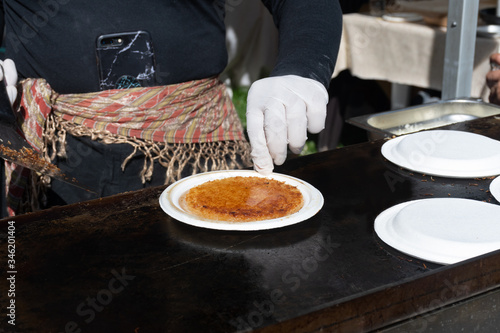 Künefe, sweet and savory levantine cheese pastry, turkish dessert specific and traditional. photo