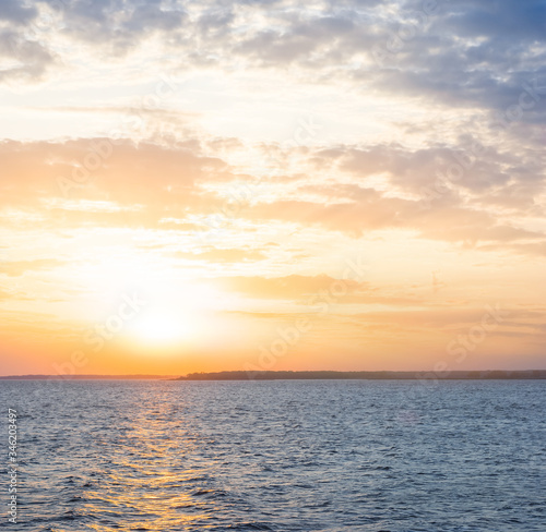 dramatic sunset over the quiet sea bay  outdoor vacation scene