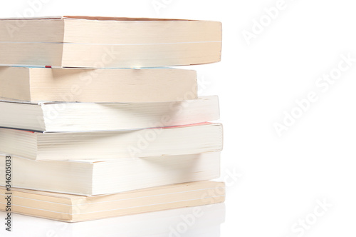 stacked books on a white background