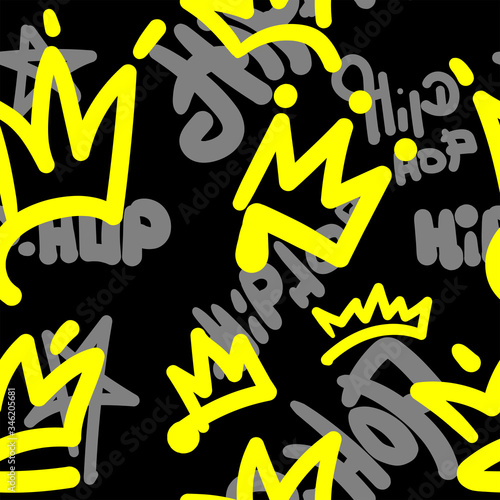 Seamless pattern with crowns and hip hop lettering drawn by hand. Music print. Stylish vector illustration.