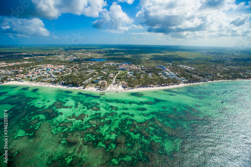 Punta Cana Bavaro beach aerial drone view on tropical coastline in Cortecito area, Dominican republic 