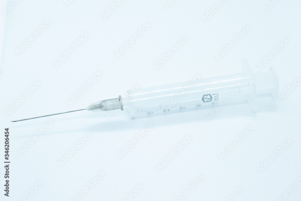 A non-breeding medical syringe for inyctions located on a white background A non-breeding medical syringe for inyctions located on a white background