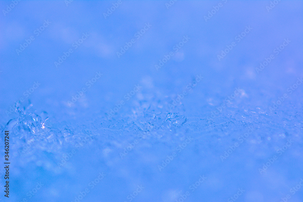 Obraz premium Frozen water blue background.