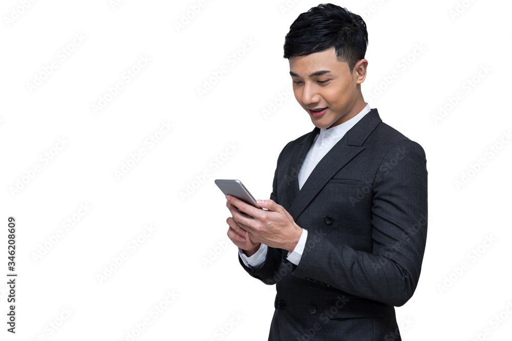 Portrait of Young Asian businessman holding mobile phone and smiling on white background with clipping path Portrait of Young Asian businessman holding mobile phone and smiling on white background with clipping path