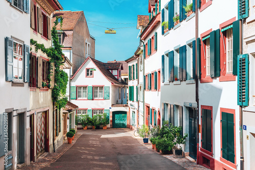 Cosy colorful street of historic old town in Basel, Switzerland