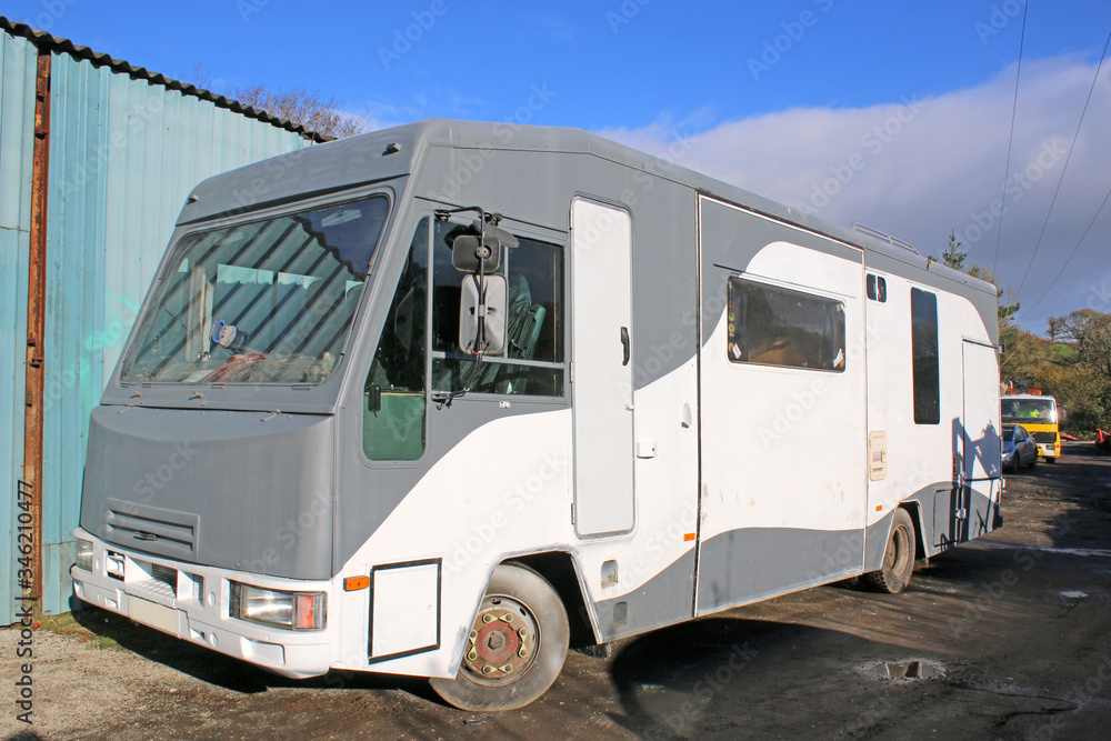 Motor Home in a yard	