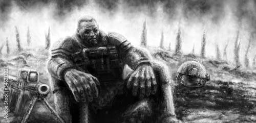 A tired soldier sits on the battlefield with his arms dangling from his knees.