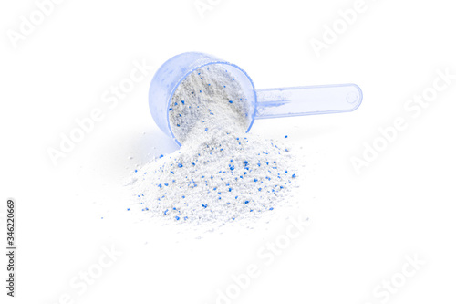 Detergent background. Wash powder with cup for laundry, washing machine isolated on white background. Soap clean texture with scoop. Dry cleaning, Chores of housewife concept. Regular washing.
