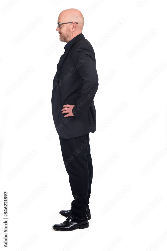 bald man with glasses on white background,profile hands on hip bald man with glasses on white background,profile hands on hip