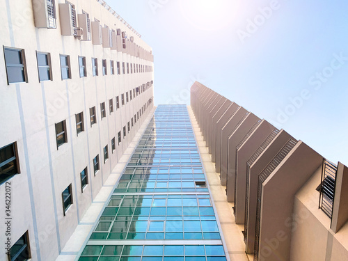 Sunshine architecture with building with windows in sunny day. Modern background