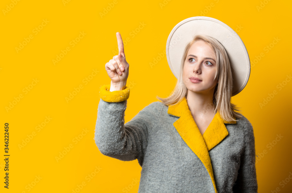 Style blonde woman in hat nad autumn season coat Style blonde woman in hat nad autumn season coat