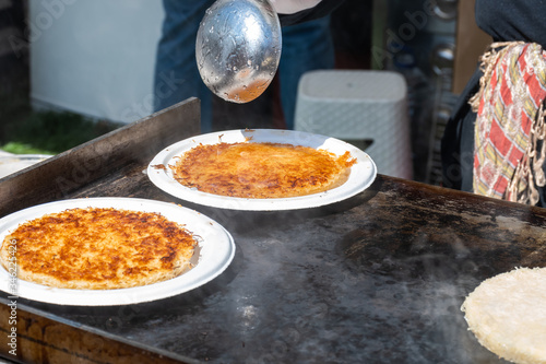 Künefe, sweet and savory levantine cheese pastry, turkish dessert specific and traditional. photo