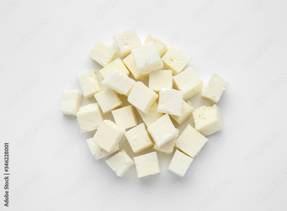 Tasty cut feta cheese on white background Tasty cut feta cheese on white background