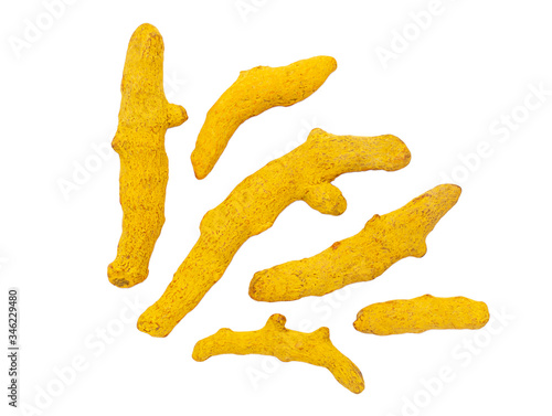 Dry turmeric roots isolated on white background.