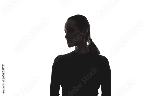 Obraz na plátně black and white silhouette of woman with head turned sideways, portrait