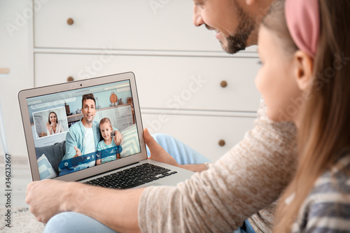 Father with little daughter...