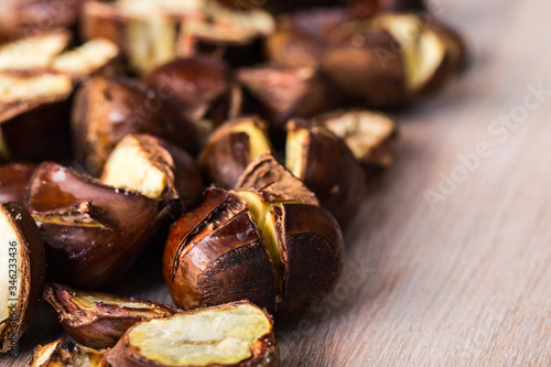 Toasted edible chestnuts, European seasonal treat close-up