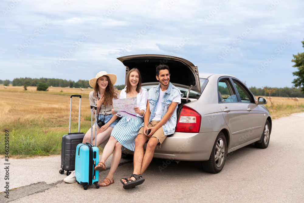 The company of friends went on a trip by car. The company of friends went on a trip by car.