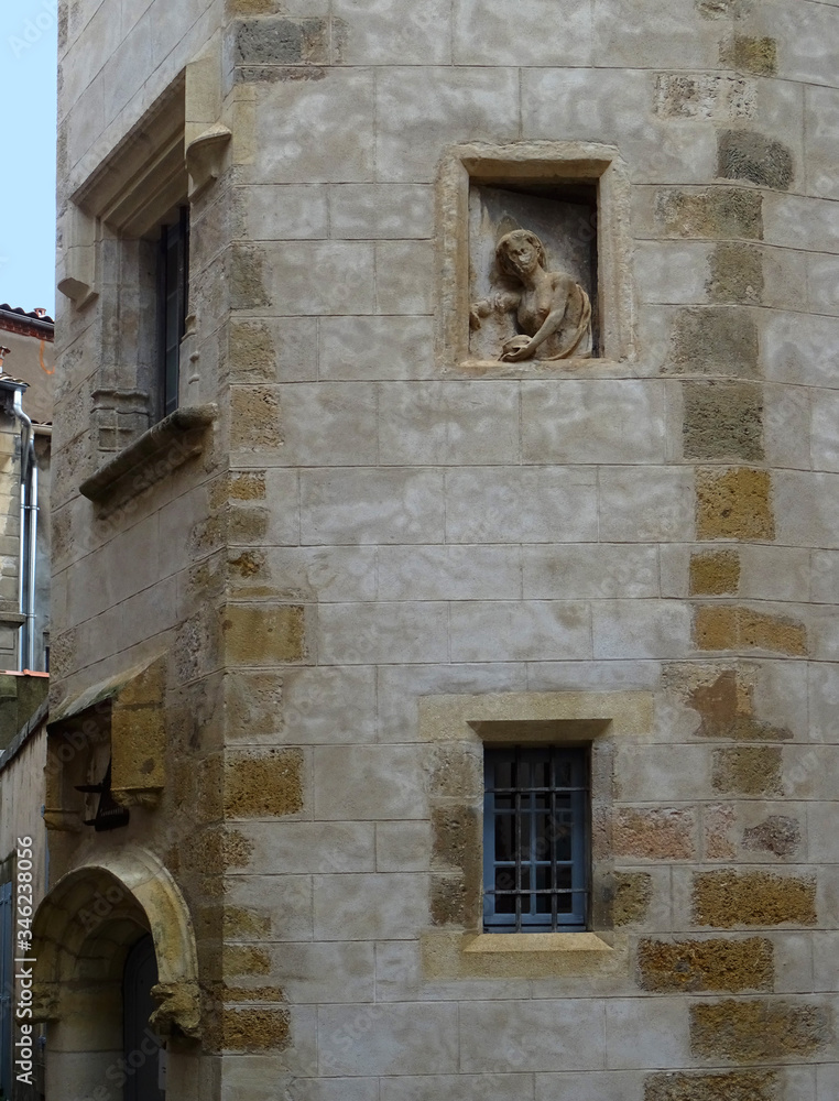 Curious gothic building in the old city center of Narbonne. France.