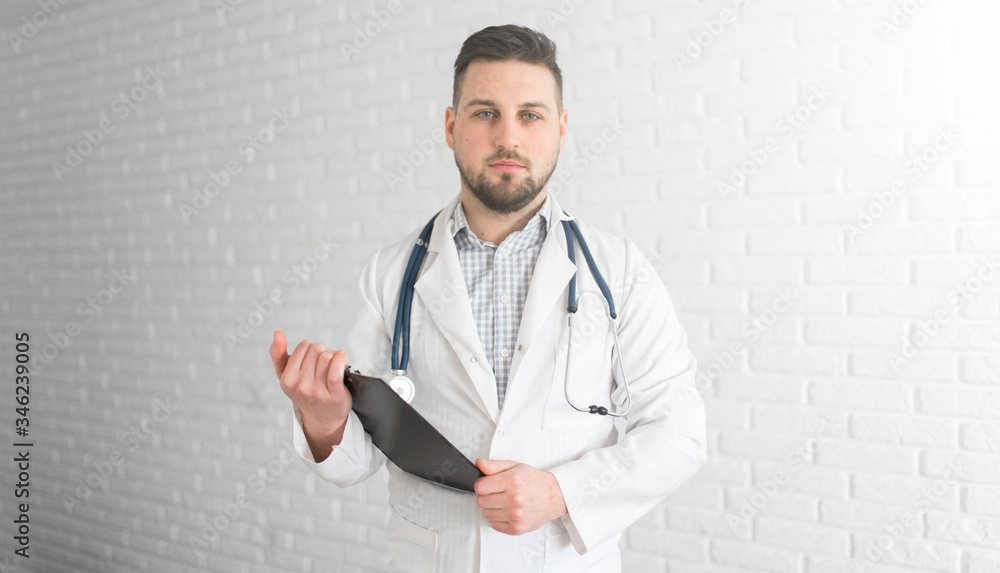Young handsome doctor in hospital