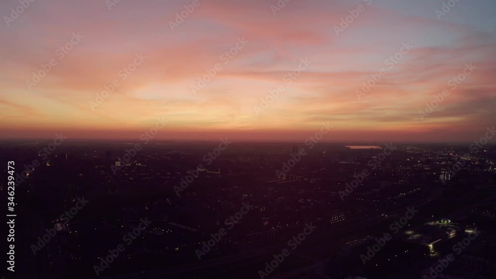 Aerial drone hyperlapse flight Over Amsterdam Rhine Canal During Orange Red Sunset Skies, Netherlands Aerial drone hyperlapse flight Over Amsterdam Rhine Canal During Orange Red Sunset Skies, Netherlands