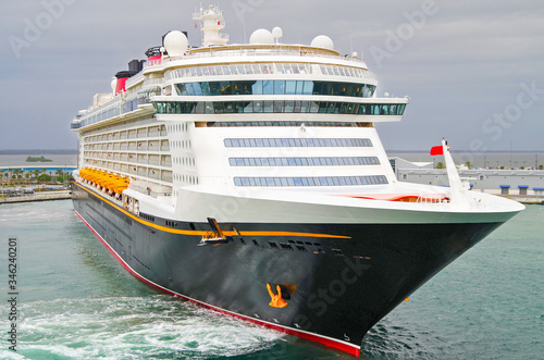Huge modern Disney Cruise Line cruiseship or cruise ship liner Disney Dream or Disney Fantasy departure from Orlando cruise port Port Canaveral for Caribbean cruising on family vacation