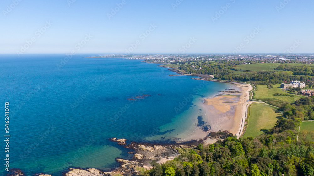 Aerial view of Coast of Irish Sea in Helen's Bay, Northern Ireland. View from above on beach in sunny day