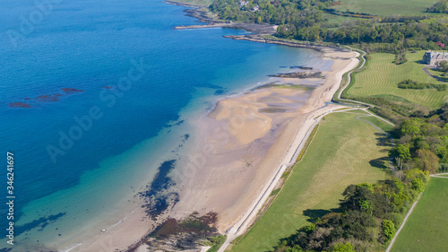 Aerial view of Coast of Irish Sea in Helen's Bay, Northern Ireland. View from above on beach in sunny day © Maciej