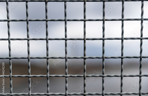 Background texture of Metal fence. View from prison window. 