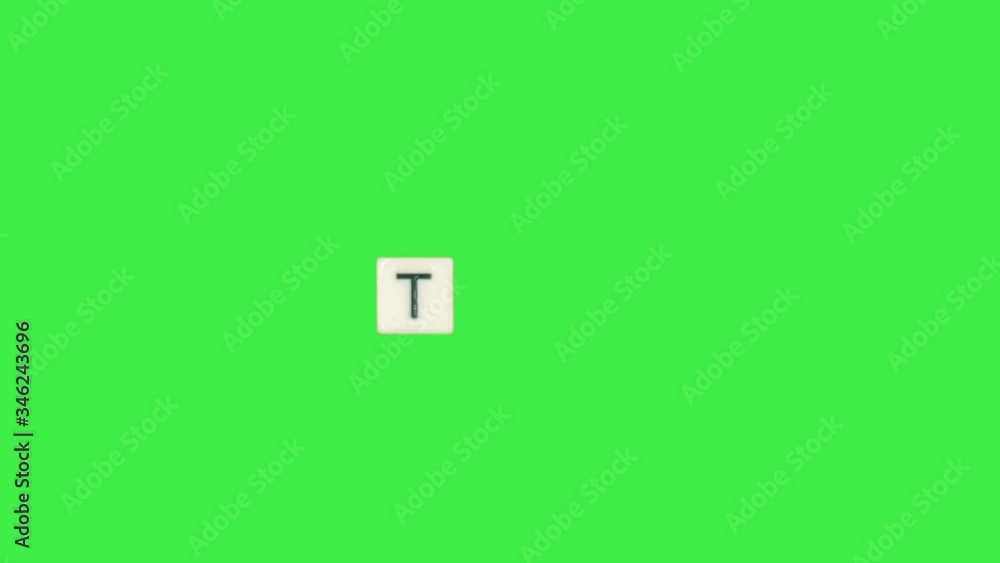 Letter T scrabble slide from left to right side on green screen, letter T green background Letter T scrabble slide from left to right side on green screen, letter T green background