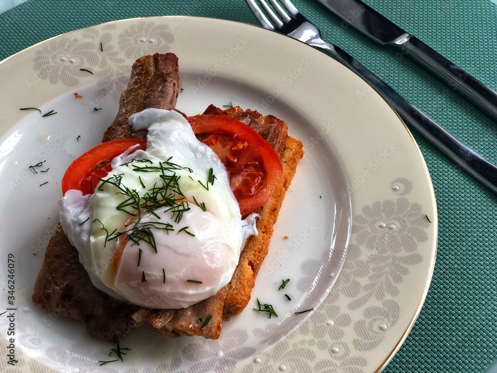 Belgian waffle with salmon and porched egg