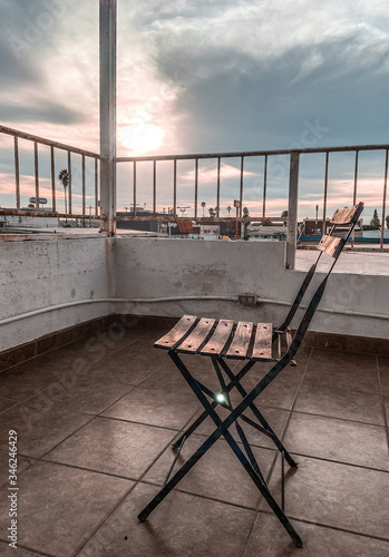 Chair on the roof of the building. Ensenada. Baja California. Mexico. © Dary Maltseva