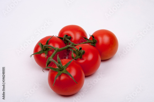 tomatoes on a vine © bubu45