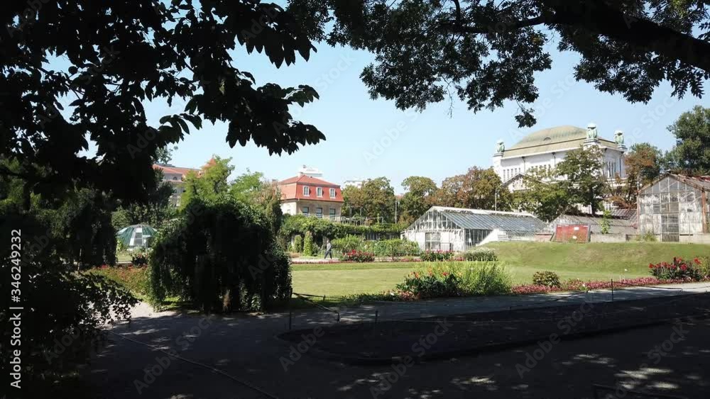 Calm wide view of the sight of plain botanical garden / park in Zagreb, Croatia, relaxing during the day in the shadow. Calm wide view of the sight of plain botanical garden / park in Zagreb, Croatia, relaxing during the day in the shadow.