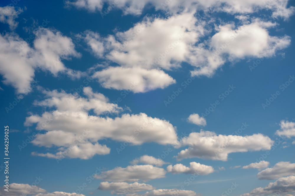 Background for your artwork: Clouds in the blue sky Background for your artwork: Clouds in the blue sky
