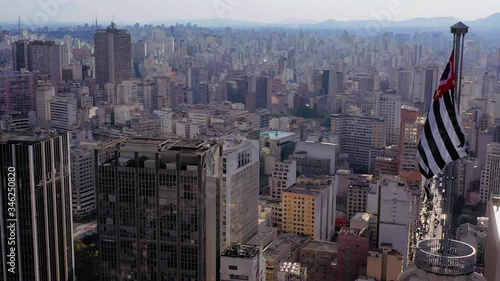 Aerial view of Altino Arantes building, called Banespao with the flag fluttering, Sao Paulo downtown, Brazil photo