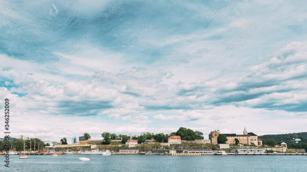 Oslo, Norway. Akershus Fortress, Oslo City Hall And Floating Ships Near Aker Brygge District. Summer Day. Famous And Popular Place. 4K Oslo, Norway. Akershus Fortress, Oslo City Hall And Floating Ships Near Aker Brygge District. Summer Day. Famous And Popular Place. 4K