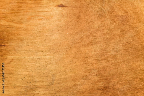 background texture of the wood plywood is old yellowed.