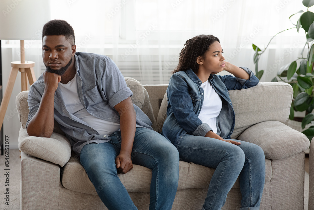 Obraz premium Black Spouses Sitting Offended To Each Other After Argue At Home