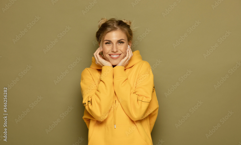 Brilliant smile on beautiful woman. Happy funny girl on color background. Brilliant smile on beautiful woman. Happy funny girl on color background.