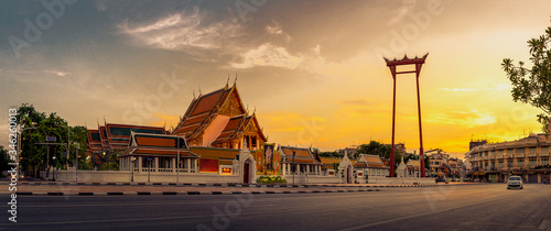 panorama public places, The beauty of Wat Suthat and Sao Ching Cha (Giant Swing) during sunset. photo