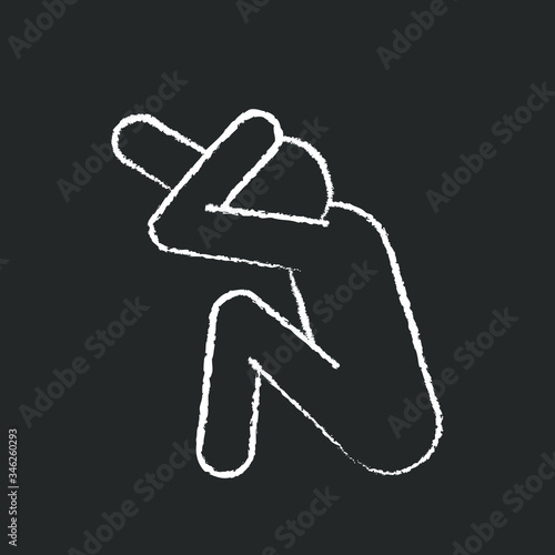 person sits and covers his face from a blow, chalk icon