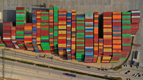 Aerial drone top down photo of colourful containers parked in Mediterranean container terminal photo