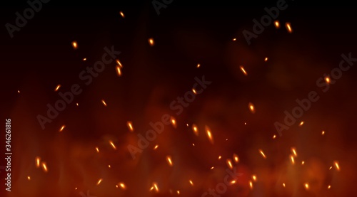 Burning red hot sparks fly from large fire in the night sky. Lag Baomer symbol