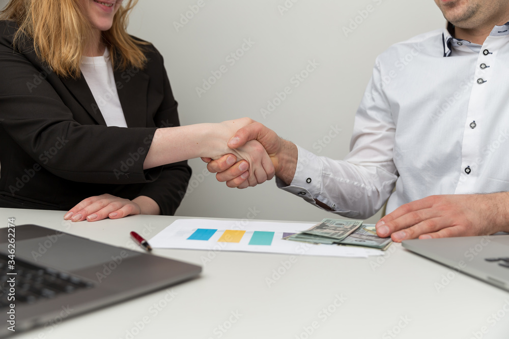 Business deal in office. Commercial agreement with discussion of details Business deal in office. Commercial agreement with discussion of details