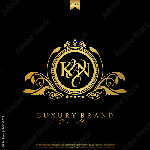 Logo Initial letter KN luxury vector mark, gold color elegant classical symmetric curves decor.