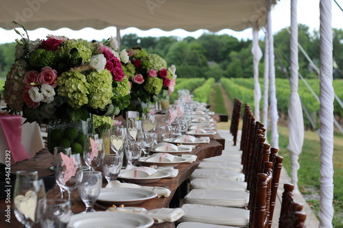 outdoor wedding at a vineyard  dinner set up
