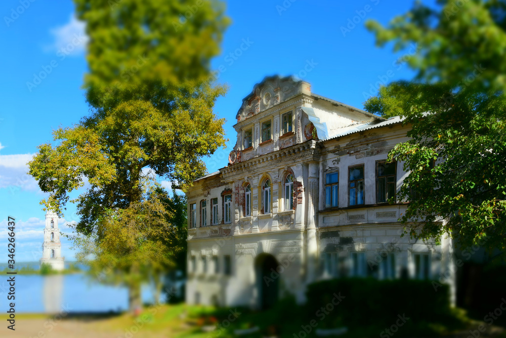 Old apartment building in the ancient city of Kalyazin in Russia. Selective focus. Miniature photo effect.