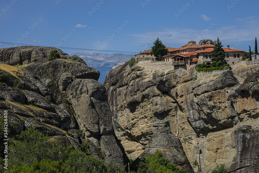 Monastery, located on rocky abyss top at height of more than 400 meters. Meteora is one of largest, most important complexes of Eastern Orthodox monasteries in Greece. Meteora, Peneas Valley, Greece. Monastery, located on rocky abyss top at height of more than 400 meters. Meteora is one of largest, most important complexes of Eastern Orthodox monasteries in Greece. Meteora, Peneas Valley, Greece.